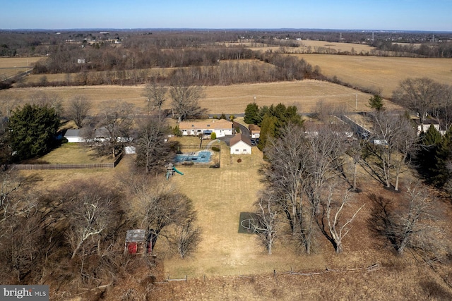 birds eye view of property featuring a rural view