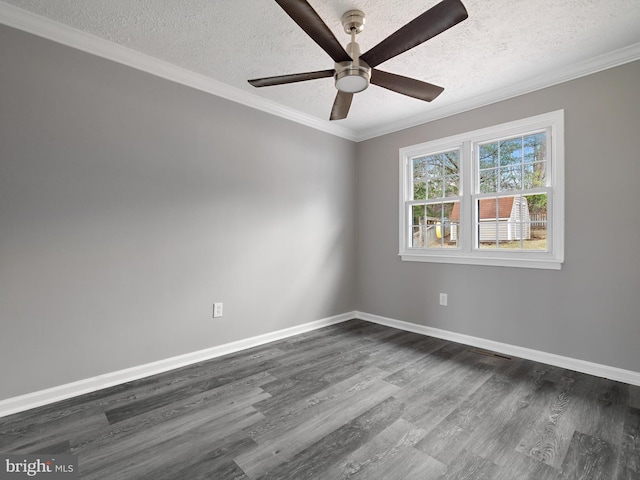 empty room with dark wood-style floors, a textured ceiling, ceiling fan, and ornamental molding