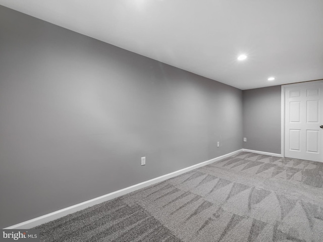 interior space featuring recessed lighting and baseboards