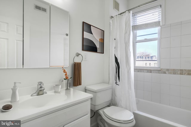 bathroom with vanity, shower / bath combination with curtain, toilet, and visible vents