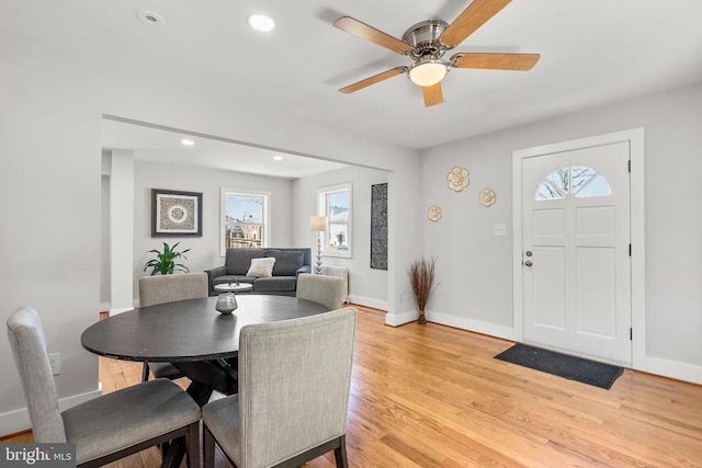 dining space with recessed lighting, light wood-style floors, baseboards, and ceiling fan