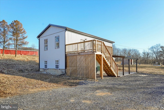 view of outdoor structure featuring stairs