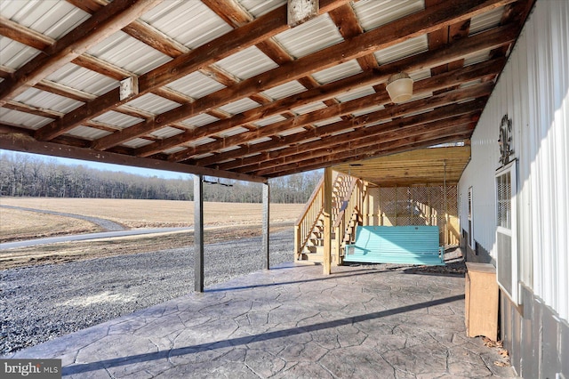 view of patio / terrace featuring stairway