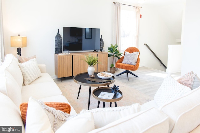 living area with light wood-style floors