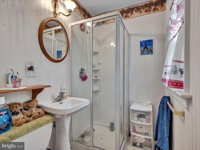 full bathroom with a shower stall