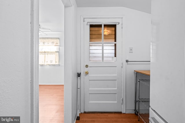 doorway with wood finished floors