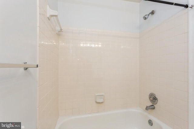 bathroom with shower / bath combination