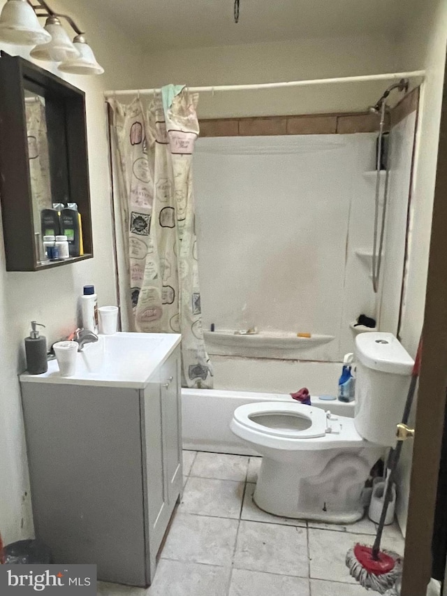 bathroom featuring vanity, toilet, and shower / bathtub combination with curtain