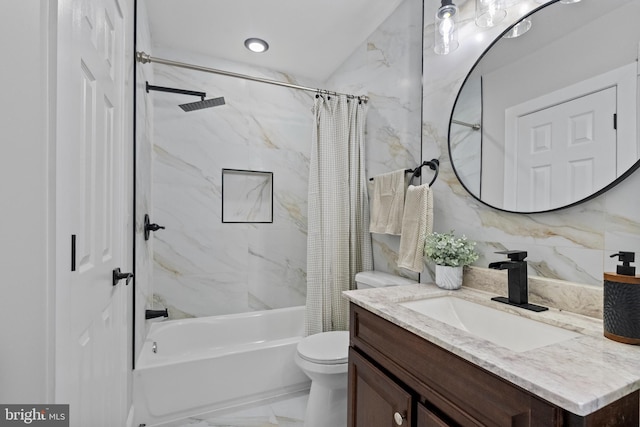 full bathroom with shower / tub combo with curtain, marble finish floor, toilet, tile walls, and vanity