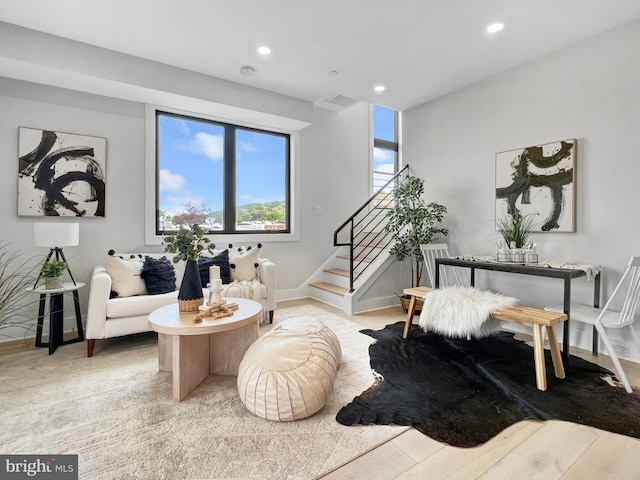 sitting room featuring recessed lighting, stairway, baseboards, and visible vents