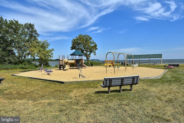 community playground featuring a lawn