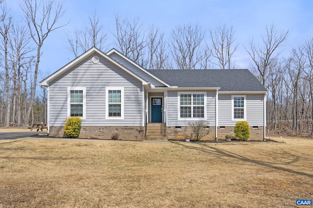 ranch-style house featuring a shingled roof, a front yard, and crawl space