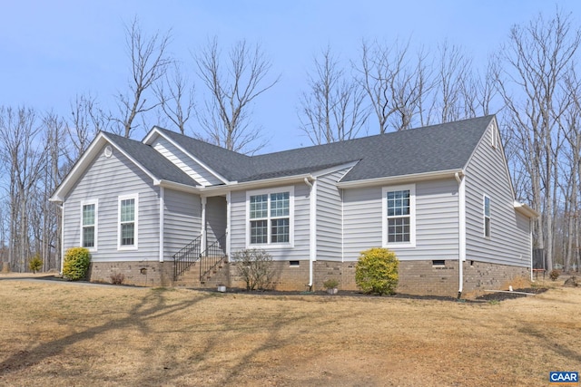 ranch-style home featuring crawl space, a shingled roof, and a front yard