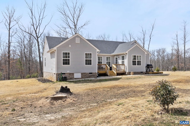 view of front of house with crawl space, a shingled roof, and a deck