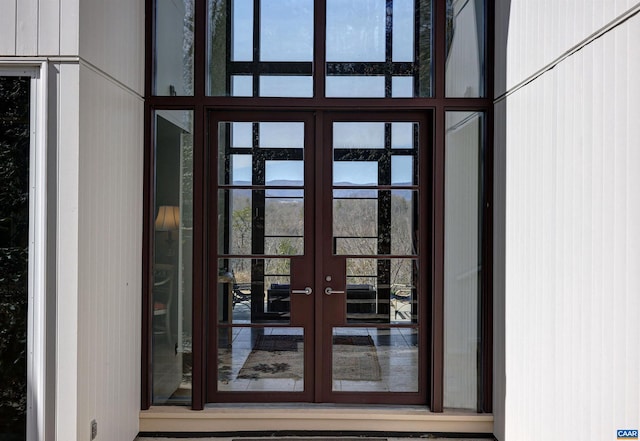 entrance to property featuring french doors