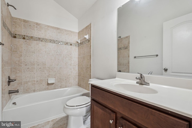 full bathroom featuring shower / bathtub combination, toilet, lofted ceiling, and vanity