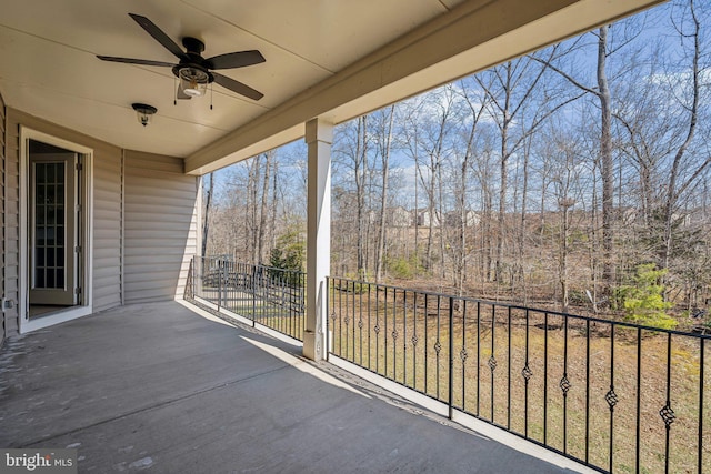 balcony featuring a ceiling fan