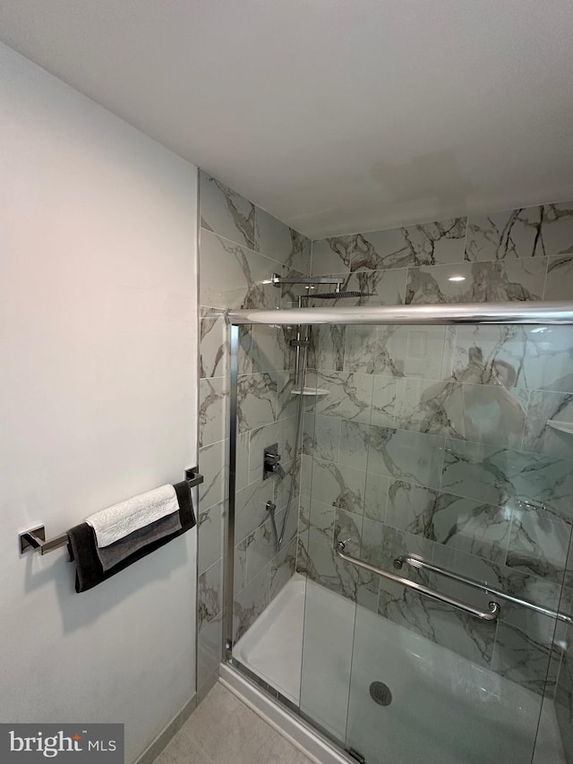 bathroom featuring a shower stall