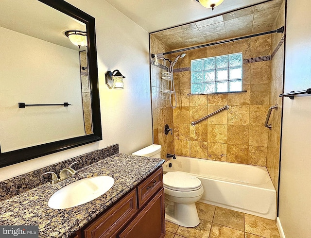 bathroom featuring vanity, toilet, and shower / washtub combination