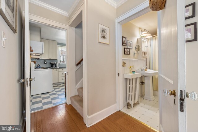 901 S Talbot, Saint Michaels, MD 21663 - hall with ornamental molding, stairway, and hardwood / wood-style flooring