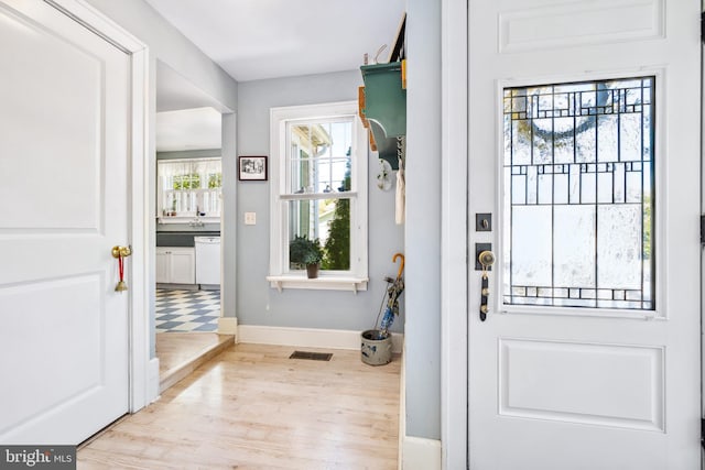 901 S Talbot, Saint Michaels, MD 21663 - interior space with wood finished floors, baseboards, and visible vents