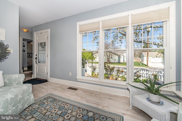 901 S Talbot, Saint Michaels, MD 21663 - interior space with wood finished floors, baseboards, and visible vents