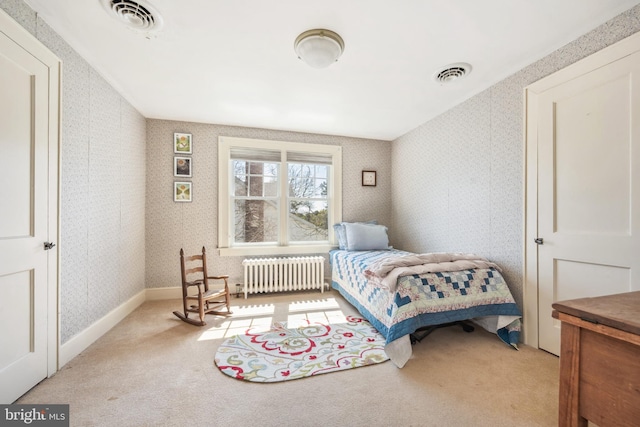 901 S Talbot, Saint Michaels, MD 21663 - carpeted bedroom with visible vents, radiator, and wallpapered walls