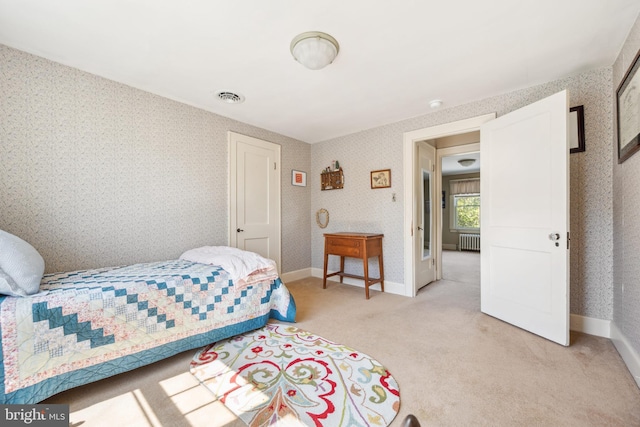 901 S Talbot, Saint Michaels, MD 21663 - bedroom with light carpet, radiator, wallpapered walls, and visible vents