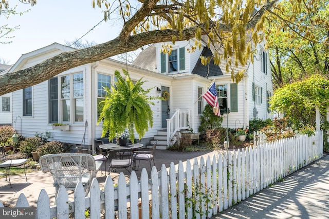 901 S Talbot, Saint Michaels, MD 21663 - view of front facade with a patio and a fenced front yard