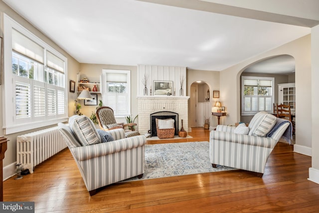 901 S Talbot, Saint Michaels, MD 21663 - living area featuring arched walkways and plenty of natural light
