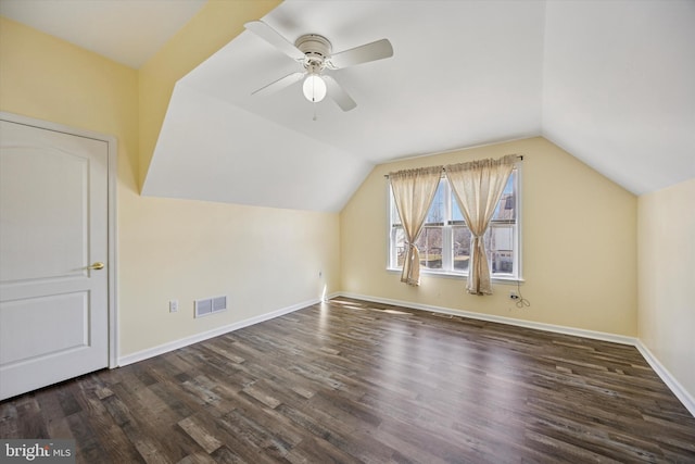 bonus room with visible vents, ceiling fan, baseboards, vaulted ceiling, and wood finished floors