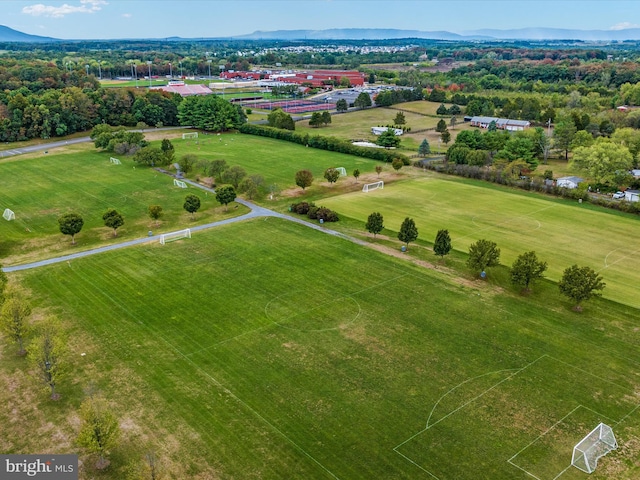 birds eye view of property with a rural view