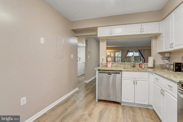 kitchen featuring stainless steel dishwasher, white cabinets, and light wood-style flooring