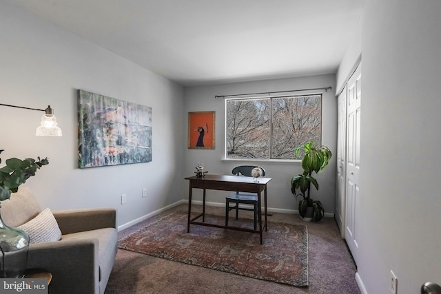 carpeted home office with baseboards