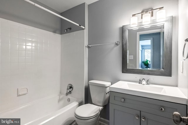 full bath with shower / bath combination, toilet, and vanity