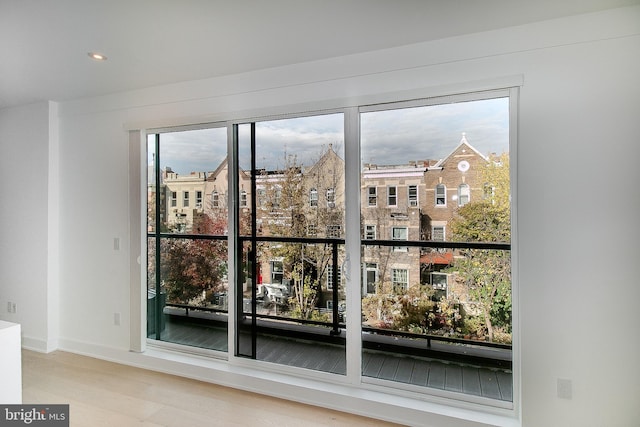 interior space featuring recessed lighting and wood finished floors