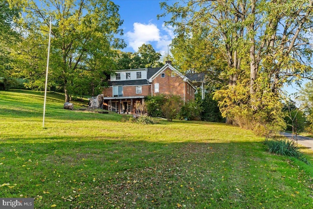 306 Burnt Church Rd, Winchester, VA 22603 - view of front of home with brick siding and a front yard