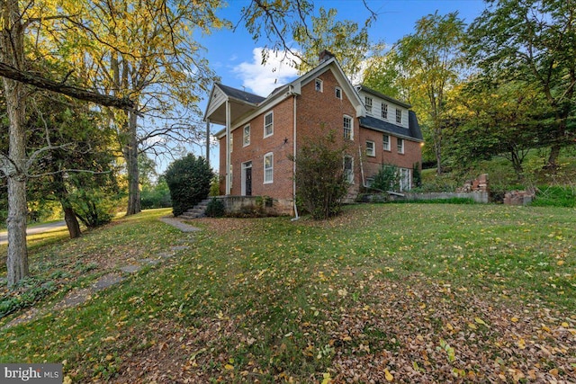 306 Burnt Church Rd, Winchester, VA 22603 - view of property exterior featuring brick siding and a yard