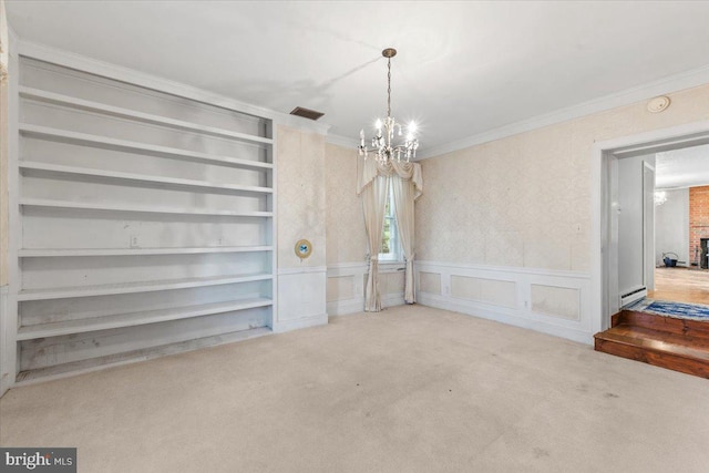 306 Burnt Church Rd, Winchester, VA 22603 - unfurnished dining area featuring visible vents, ornamental molding, carpet floors, an inviting chandelier, and wainscoting