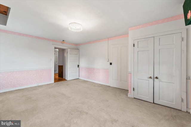 306 Burnt Church Rd, Winchester, VA 22603 - unfurnished bedroom featuring baseboards, a closet, and carpet floors