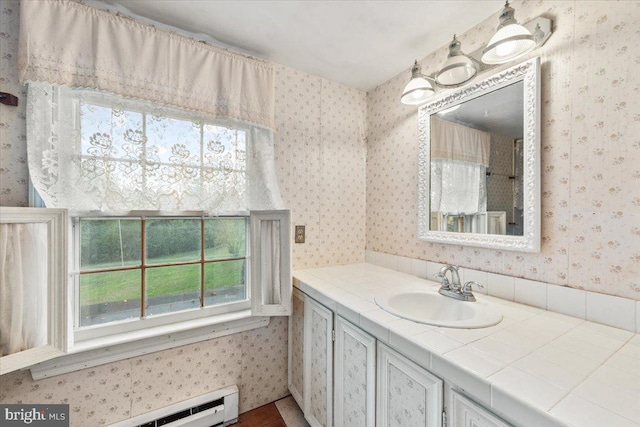 306 Burnt Church Rd, Winchester, VA 22603 - bathroom with wallpapered walls, vanity, and a baseboard heating unit