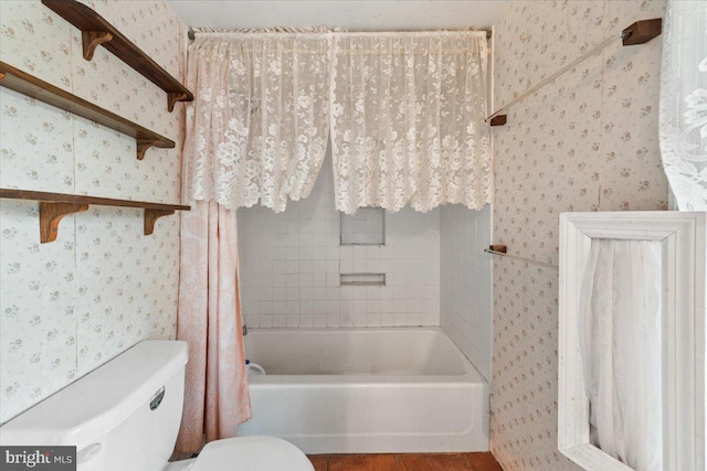 306 Burnt Church Rd, Winchester, VA 22603 - bathroom with wallpapered walls, shower / bathtub combination with curtain, and toilet