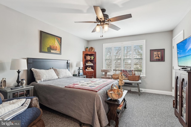 bedroom with ceiling fan, carpet, and baseboards