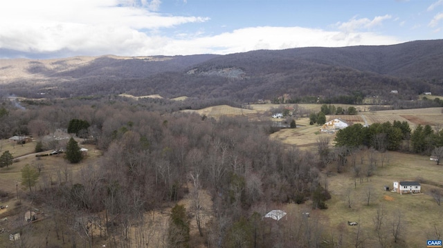 view of mountain feature with a rural view