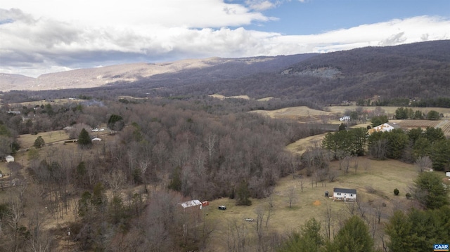 drone / aerial view with a mountain view and a rural view