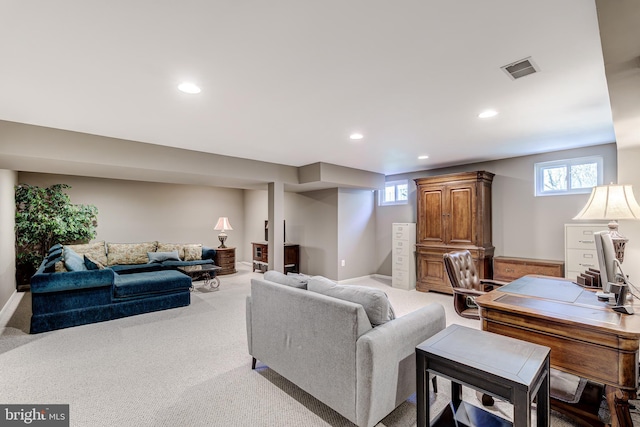 carpeted living room with recessed lighting, visible vents, and baseboards