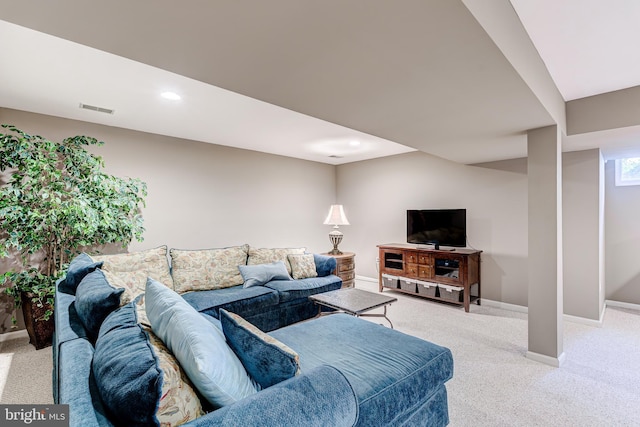 living area with recessed lighting, baseboards, visible vents, and light carpet