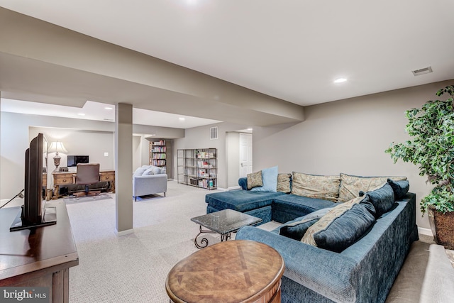 carpeted living area featuring visible vents, recessed lighting, and baseboards