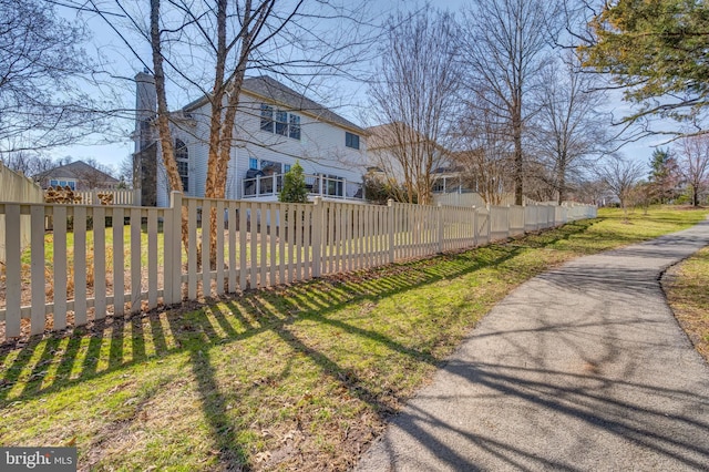 exterior space featuring a fenced front yard