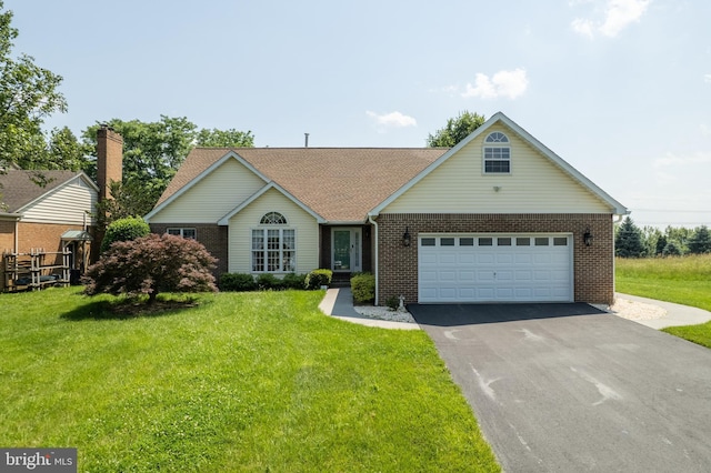 1629 Pondview Dr, Winchester, VA 22601 - view of front of property featuring brick siding, driveway, and a front lawn